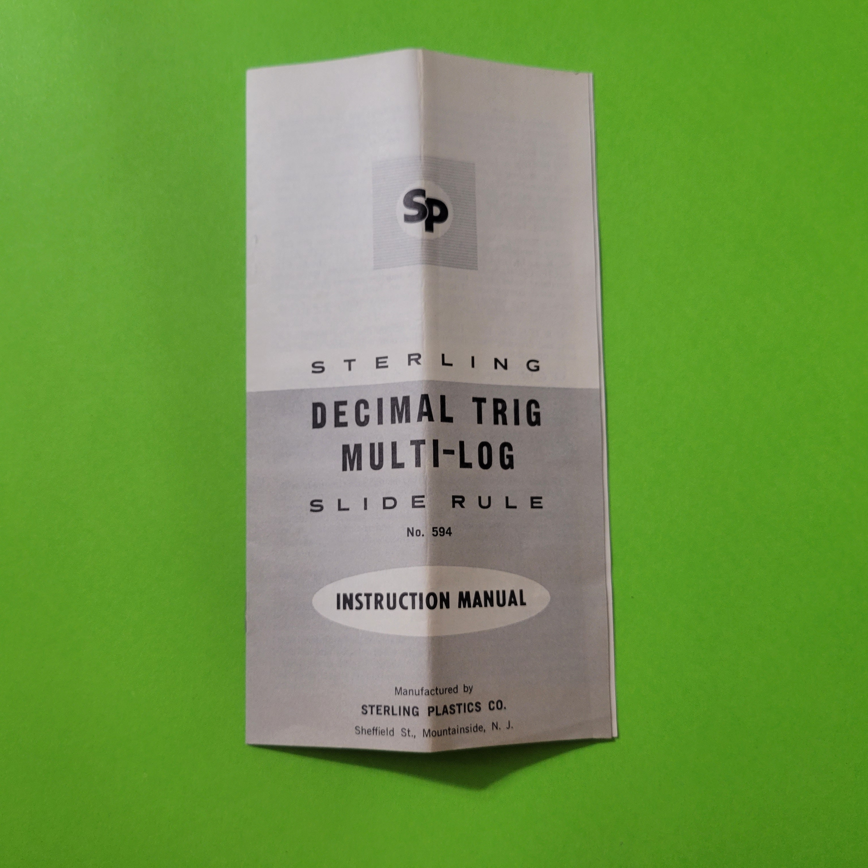 An image of the instruction manual of a Sterling Decimal Trig Multi-Log Slide Rule No.594 slide rule